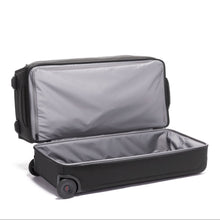 Load image into Gallery viewer, Interior view of the duffle bag with the top compartment unzipped and lifted.