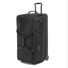 Load image into Gallery viewer, Angled front panel view of the black wheeled duffle bag.
