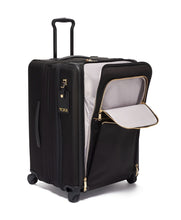 Load image into Gallery viewer, Angled front panel view of the suitcase with the expandable feature unzipped. The front panel's compartment and pockets are also unzipped.
