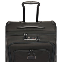Load image into Gallery viewer, Angled top view of the black suitcase. It features a telescopic handle, a grab handle and a TSA approved, three-digit combination lock.