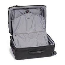 Load image into Gallery viewer, Interior view of the black suitcase with a garment bag hanging from the unzipped panel divider.