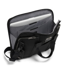 Load image into Gallery viewer, Angled interior view of the suitcase. The lining is a textured light gray and it demonstrates a laptop inside the compartment.