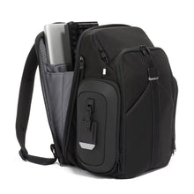 Load image into Gallery viewer, Angled front panel view of the backpack with the back compartment opened and filled with a laptop and keyboard.