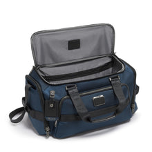 Load image into Gallery viewer, Angled front panel view of the duffel with the top lid's main compartment unzipped.