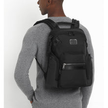 Load image into Gallery viewer, A young man carrying the backpack on his back.