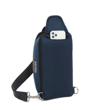 Load image into Gallery viewer, Angled back panel view of the navy blue sling bag, showing a phone peeking through the back pocket.