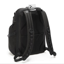 Load image into Gallery viewer, Angled back panel view of the backpack, featuring adjustable shoulder straps, and a phone compartment under the grab handle at the top.