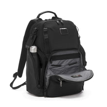 Load image into Gallery viewer, Angled front panel view of the backpack with the front and side pockets unzipped. The front pocket features organizational pockets.
