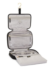 Load image into Gallery viewer, Interior view of the cosmetic bag unfolded.