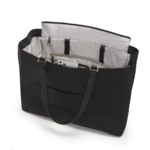 Load image into Gallery viewer, Interior view of the bag showing a phone peeking from the pocket between the grab handle.