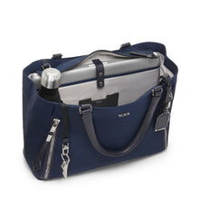 Load image into Gallery viewer, Angled front panel view showing the bag's interior with a laptop in its compartment, a water bottle, and a set of keys on the key sling.