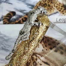 Load image into Gallery viewer, Close up to the diamond-encrusted leopard, which functions as a clip on the pen's cap.