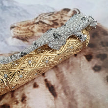 Load image into Gallery viewer, Close up to the diamond-encrusted leopard, which functions as a clip on the pen's cap.