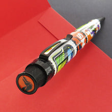 Load image into Gallery viewer, Angled top view of the pen. The disk features the icon of a dragon's face.