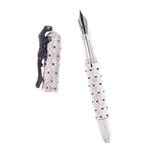 Load image into Gallery viewer, Front view of the fountain pen with the cap set to the side. Laid on a white background.