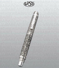 Load image into Gallery viewer, The Silver pen shown on a light gray patterned background with the URSO logo placed on top.