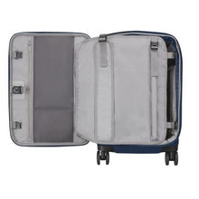 Load image into Gallery viewer, Interior view of the blue suitcase. The lining is light gray. The front panel has a zipper-closing compartment, and a foldable garment holder.