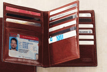 Load image into Gallery viewer, Interior view of the wallet shown with cards and identifications in the pockets.