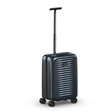 Load image into Gallery viewer, Angled front view of the navy blue suitcase with the telescopic handle extended.