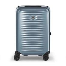 Load image into Gallery viewer, Front panel view of the light blue suitcase with the telescopic handle extended.