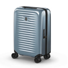 Load image into Gallery viewer, Angled front view of the light blue suitcase with the telescopic handle retracted.
