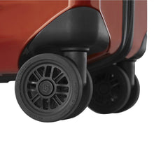 Load image into Gallery viewer, Close up to a wheel on the orange suitcase.