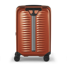 Load image into Gallery viewer, Back panel view of the orange suitcase with the telescopic handle retracted.