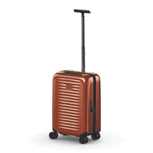 Load image into Gallery viewer, Angled front view of the orange suitcase with the telescopic handle extended.