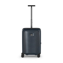 Load image into Gallery viewer, Front panel view of the dark blue suitcase with the telescopic handle extended.