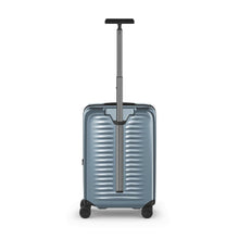 Load image into Gallery viewer, Back panel view of the light blue suitcase with the telescopic handle extended.