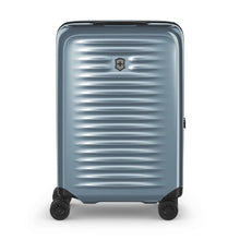 Load image into Gallery viewer, Front panel view of the light blue suitcase with the telescopic handle retracted.