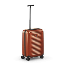 Load image into Gallery viewer, Angled front view of the orange suitcase with the telescopic handle extended.