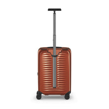 Load image into Gallery viewer, Back panel view of the orange suitcase with the telescopic handle extended.