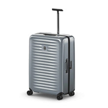 Load image into Gallery viewer, Angled front view of the gray hard shell suitcase. The telescopic handle is extended.