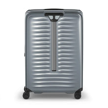 Load image into Gallery viewer, Back panel view of the gray hard shell suitcase. The telescopic handle is retracted.