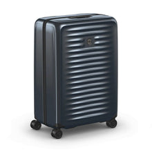 Load image into Gallery viewer, Angled front view of the suitcase of the dark blue suitcase with the telescopic handle retracted.