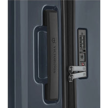 Load image into Gallery viewer, Close up to the side panel of the dark blue suitcase, showing the grab handle with the Victorinox logo engraved on it, and the TSA-approved three-digit combination lock.