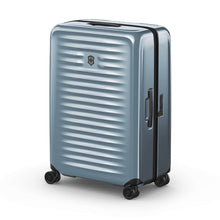 Load image into Gallery viewer, Front panel view of the light blue suitcase with the telescopic handle retracted.