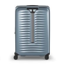 Load image into Gallery viewer, Back panel view of the light blue suitcase with the telescopic handle retracted.