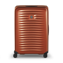 Load image into Gallery viewer, Front panel view of the orange suitcase with the telescopic handle retracted.