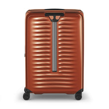 Load image into Gallery viewer, Back panel view of the orange suitcase with the telescopic handle retracted.