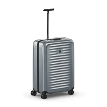 Load image into Gallery viewer, Front Angled View of the silver hard shell suitcase. The telescopic handle is extended.