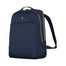 Load image into Gallery viewer, Angled front view of the blue backpack. The top front has a small Victorinox logo.