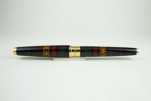 Load image into Gallery viewer, The fountain pen with the cap on. Back view.