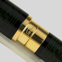 Load image into Gallery viewer, Close up to the cap and barrel rings. The Sailor logo is engraved within.