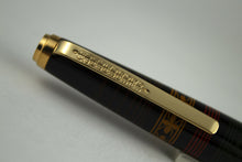 Load image into Gallery viewer, Close up to the cap, featuring an engraved decoration.