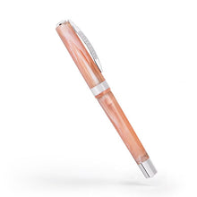 Load image into Gallery viewer, The pink fountain pen with the cap on, closed.