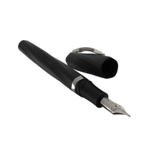 Load image into Gallery viewer, Angled view of the Visconti Divina in Black Matte Pen Series Fountain Pen, with the cap set to the side.
