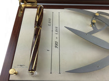 Load image into Gallery viewer, Angled view of the Fountain Pen inside its presentation box slot.