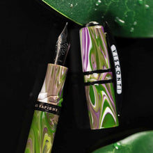 Load image into Gallery viewer, Close up to the Visconti Homo Sapiens Lotus Garden Fountain pen Nib and cap.